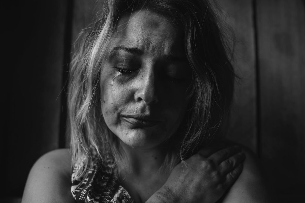 sex trafficking victim crying